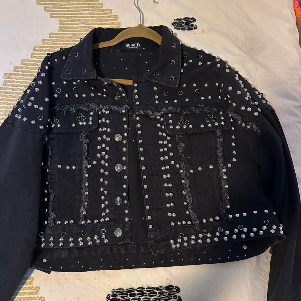 Black blinged out woman’s cropped denim jacket